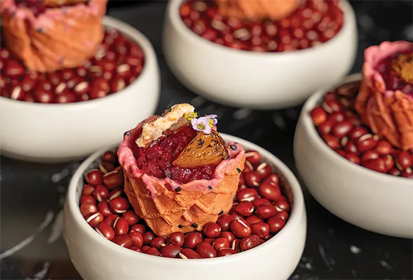 Guests enjoying canapés at an event